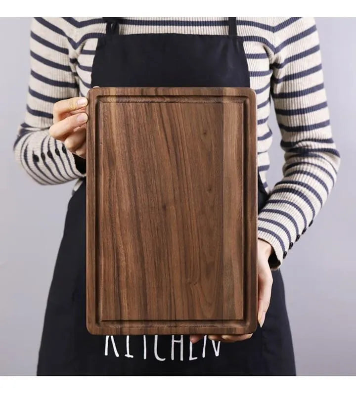 Black walnut wood cutting board with juice groove, dual-sided design, available in round and rectangular sizes for kitchen use