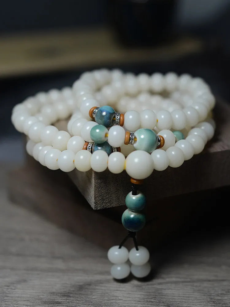 White Jade Bodhi Root Oblate Bead Bracelet with 108 natural bodhi seeds beads in 7x9mm and 8x10mm sizes