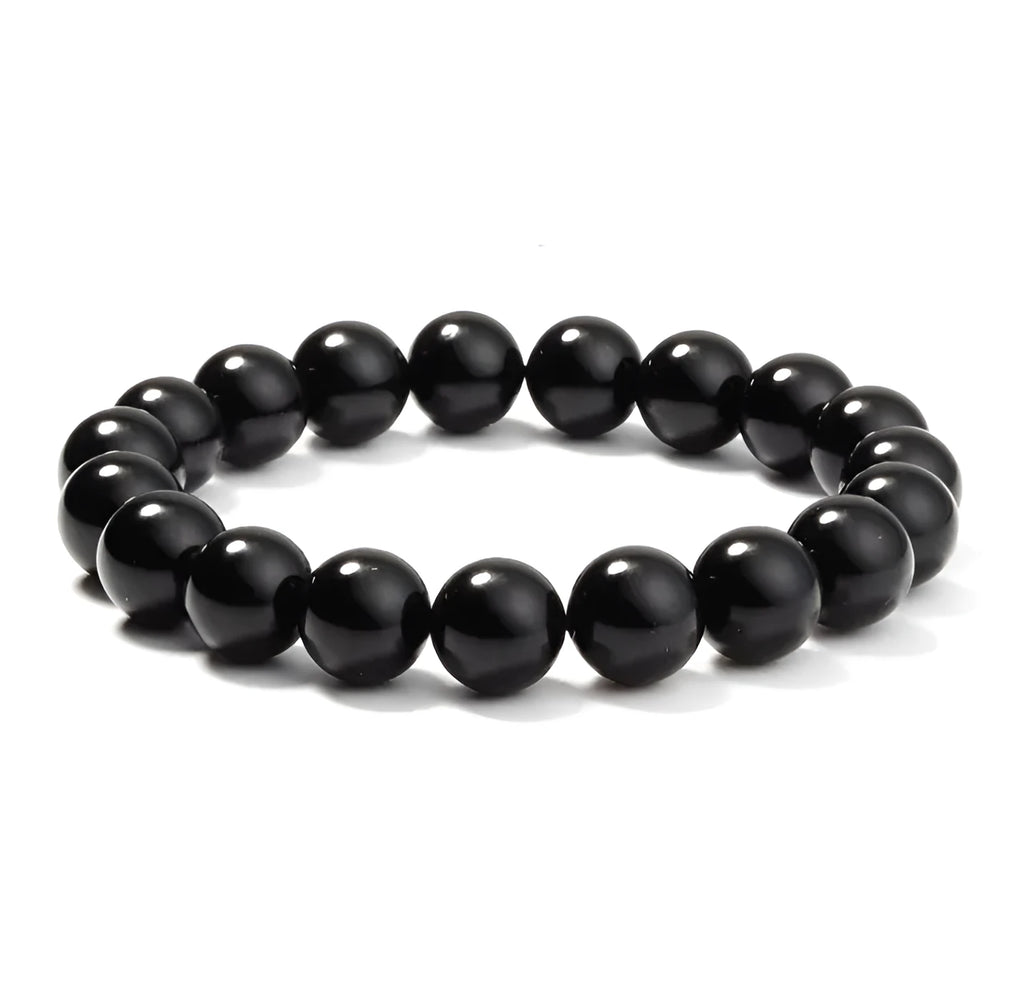 Black agate stretch bracelet with 8mm geometric beads on a black elastic cord.