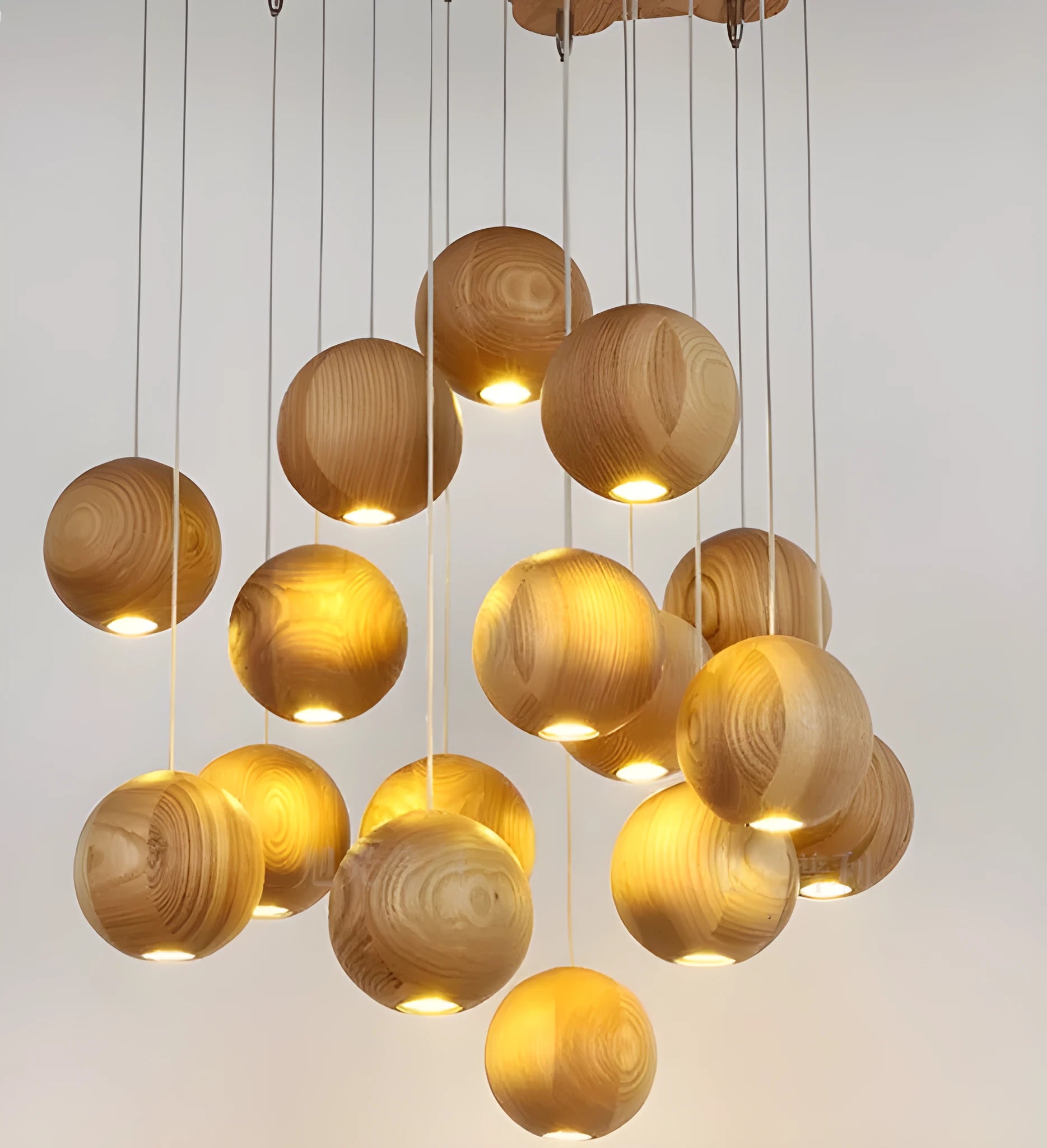 Nordic style solid wood ball chandelier pendant light with adjustable cord.