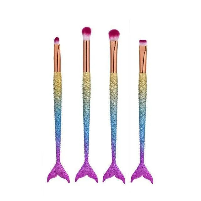 10 mermaid makeup brushes with multicolour nylon bristles and plastic handles laid flat