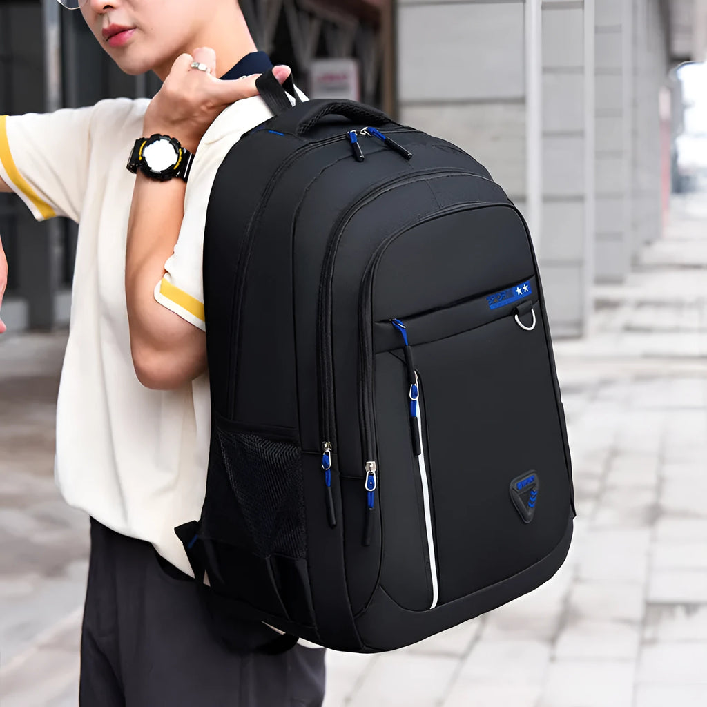 Men's Oxford cloth schoolbag in multiple colours showing large capacity and air pillow belt design