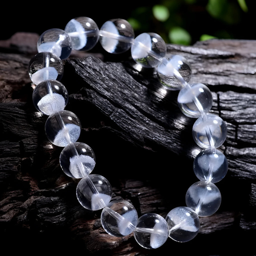 Natural white crystal ghost pyramid bracelet with Ruyi elements showing pyramid shapes and original design