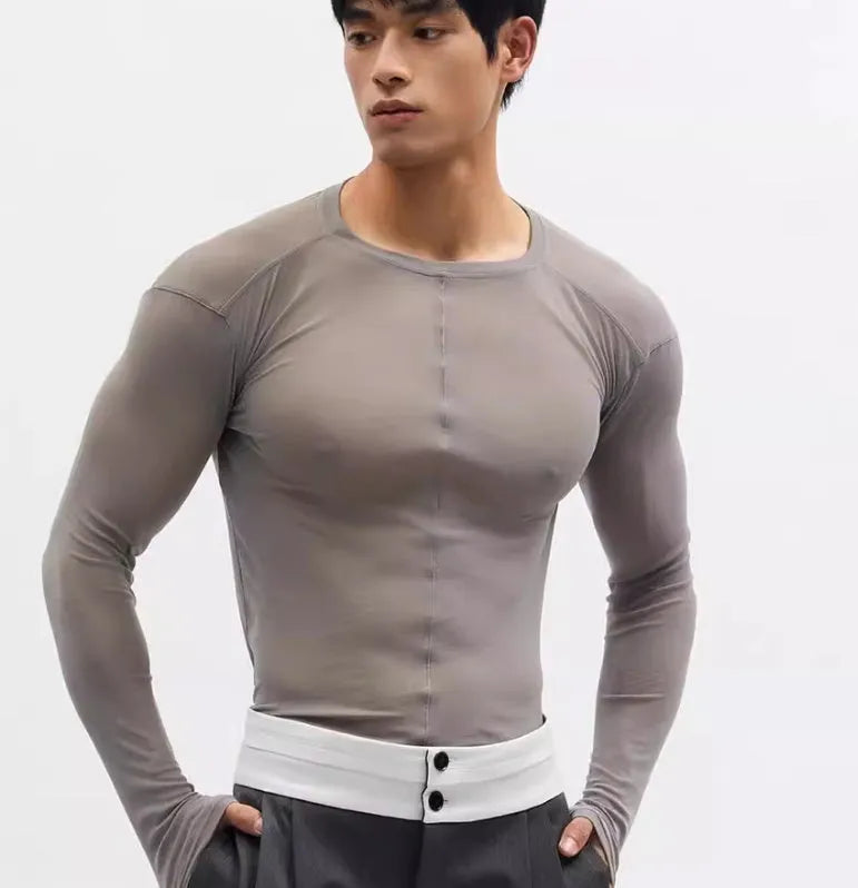 Black mesh see-through slim-fit long sleeve pullover top on a hanger