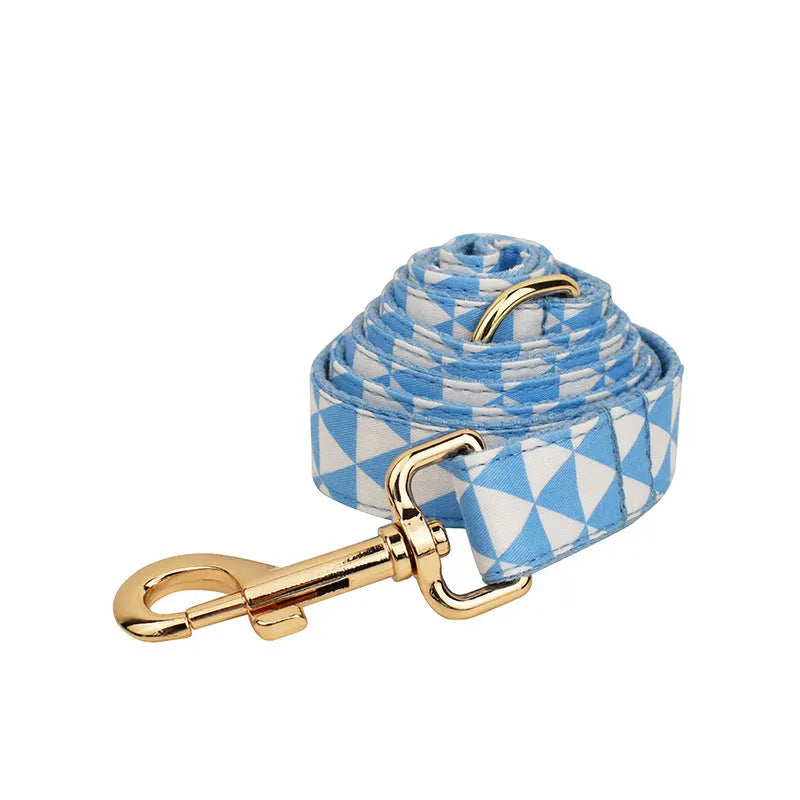 Blue triangular ring dog collar leash bow vest four-piece set on cloth material with size options XS to XL