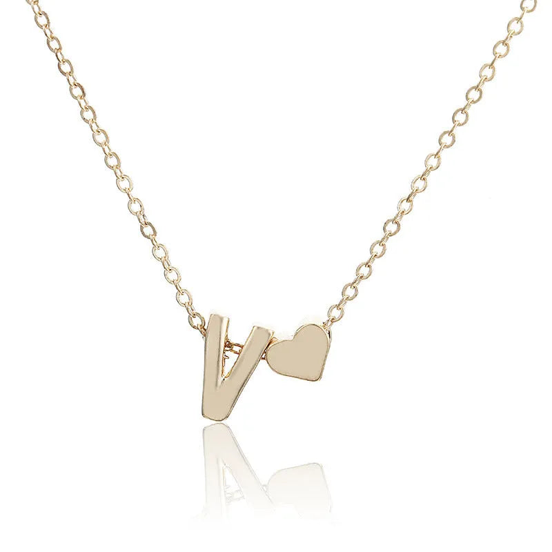 Peach heart shaped letter pendant necklace in gold and silver alloy jewellery