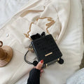 Small black PU leather one shoulder messenger bucket bag with a single chain strap.