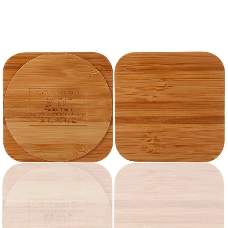 Brown heart-shaped wooden bamboo wireless charger on a table