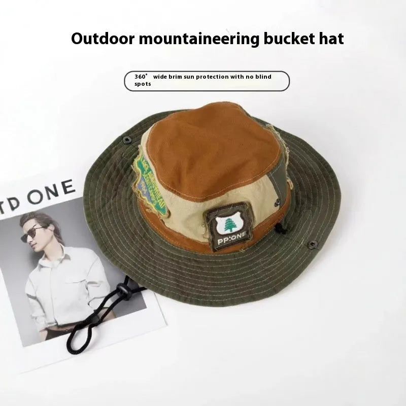 Army Green cotton fisherman hat with patchwork design and flat top crown.