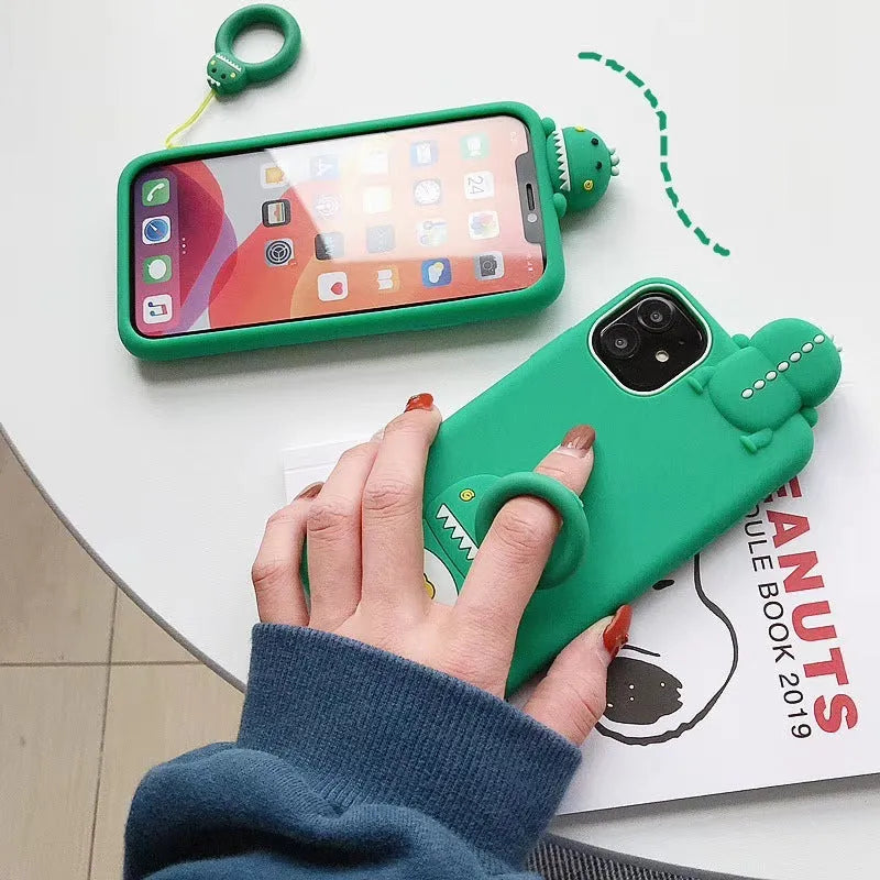 Green and yellow cartoon animal silicone back cover case for Apple iPhone models.