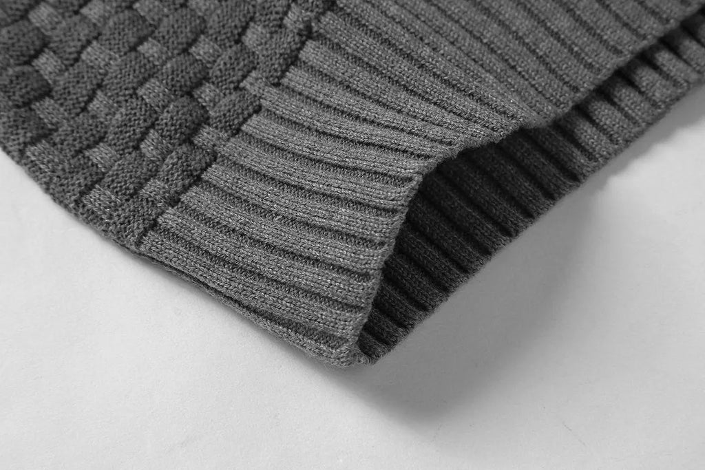 Men's black cotton polyester blend hooded sweater laid flat, showing the front design and hood.