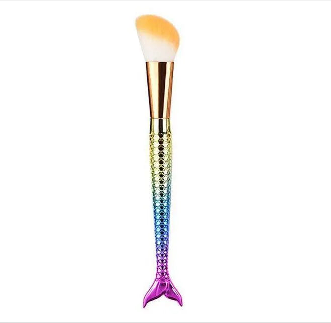 10 mermaid makeup brushes with multicolour nylon bristles and plastic handles laid flat
