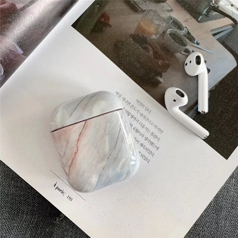 White Marble hard plastic protective case for Apple AirPods 1 and AirPods 2 wireless headset.