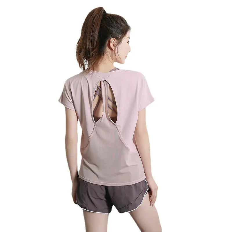 Women's short sleeve polyester sports t-shirt in pink, available in sizes S to XL