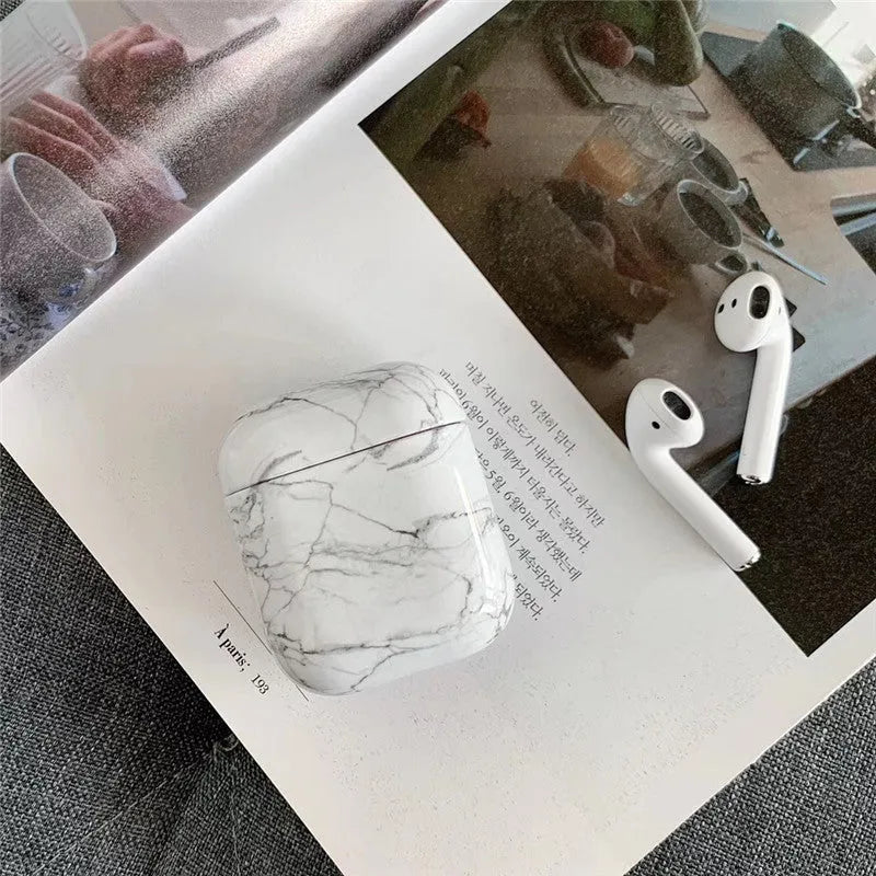 White Marble hard plastic protective case for Apple AirPods 1 and AirPods 2 wireless headset.