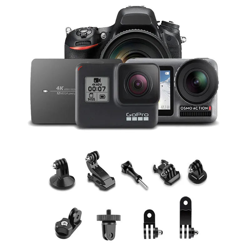 Black Bluetooth selfie stick with wireless remote and tripod extended on table, holding a smartphone in portrait orientation
