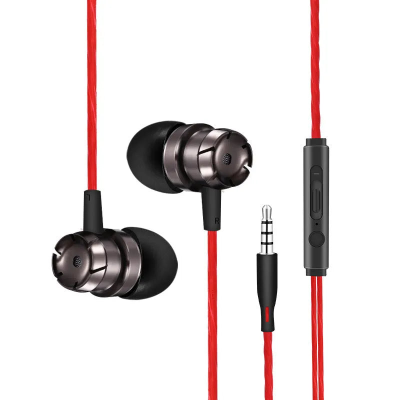 Metal turbo in-ear wired headphones with 3.5mm plug and microphone on a surface