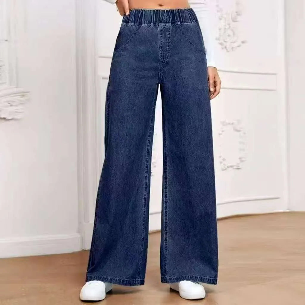 Light blue washed wide-leg jeans showing straight cut and mid waist design