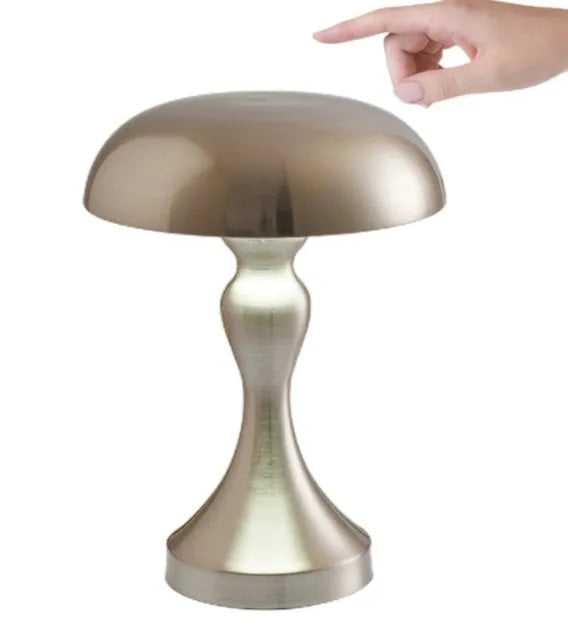Metallic-finish touch-control LED desk lamp showing three colour light modes on a wooden desk.