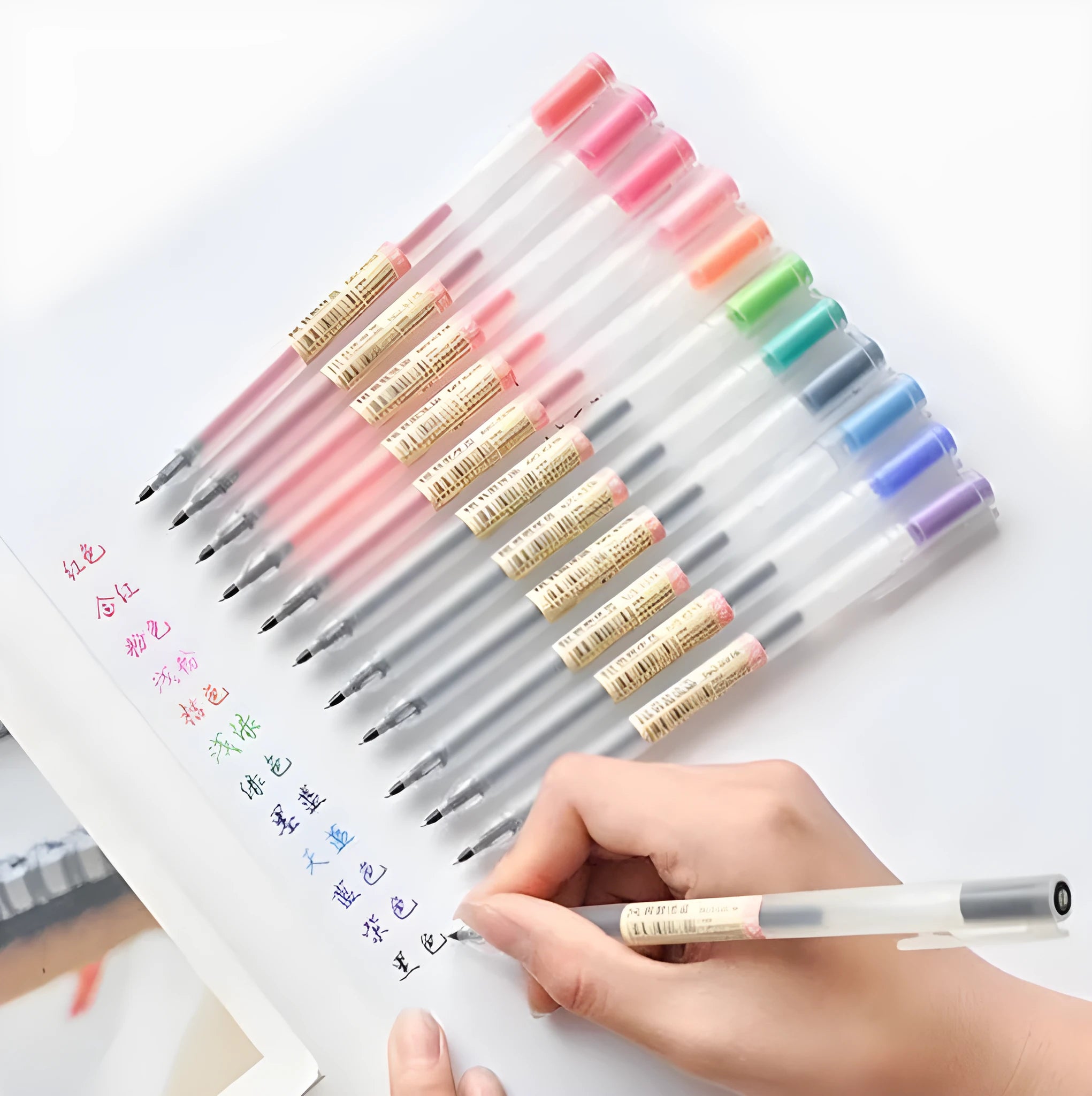 12 Muji 0.5mm gel pens with fine nibs and ink prevention mechanism.