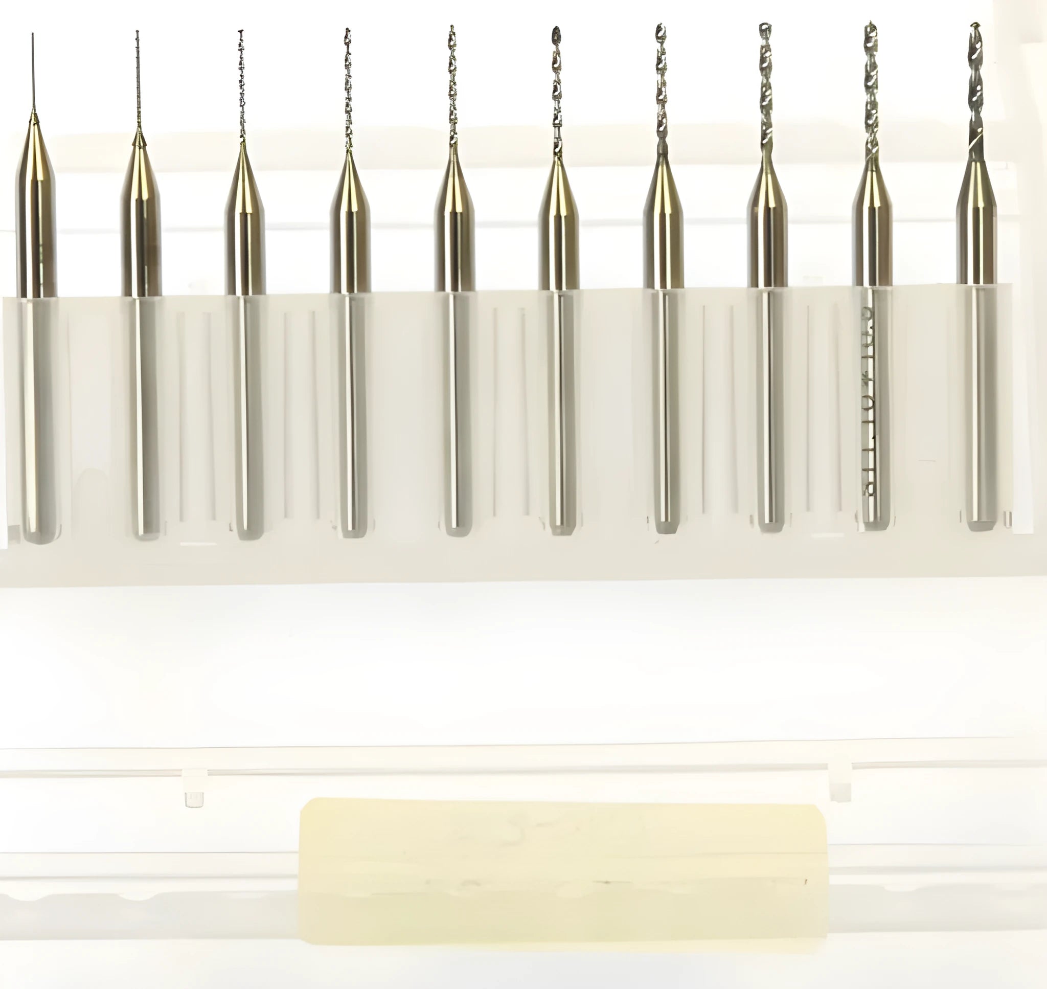 Set of imported tungsten steel micro engraving bits ranging from 0.10mm to 2.00mm in diameter.