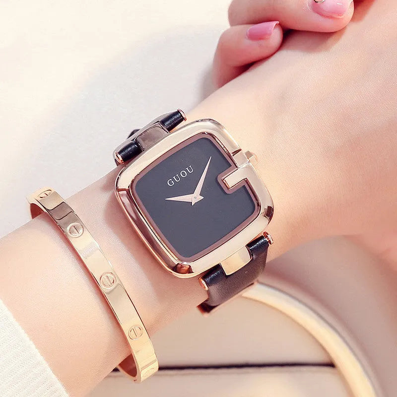 Square quartz watch with 36mm dial, leather strap, rose gold buckle, and mineral glass