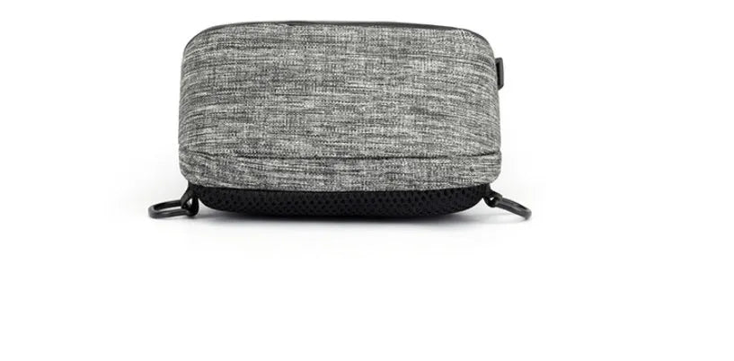 Small dark blue oxford cloth waterproof chest bag with a single strap, shown with the zipper open.
