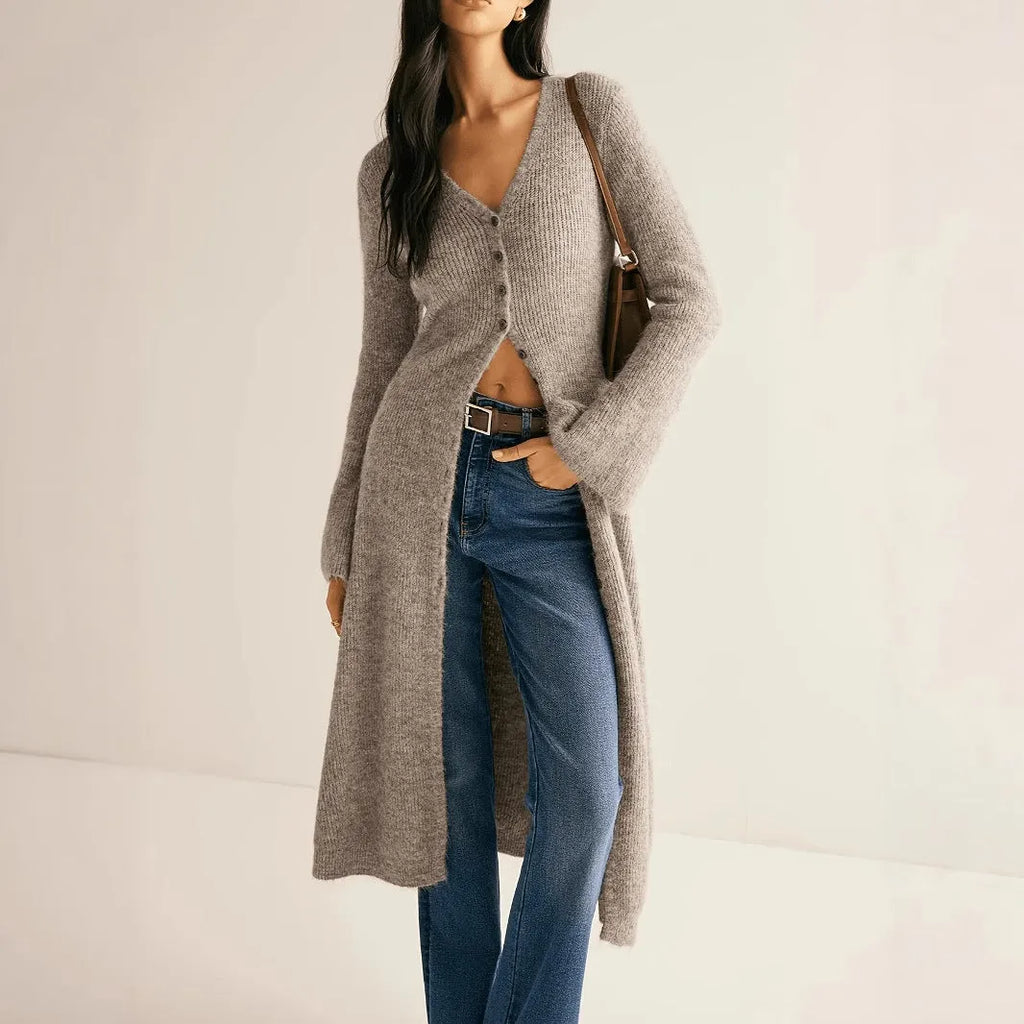 Retro French style long sleeve cardigan coat in khaki with button front on a woman, soft acrylic and viscose blend