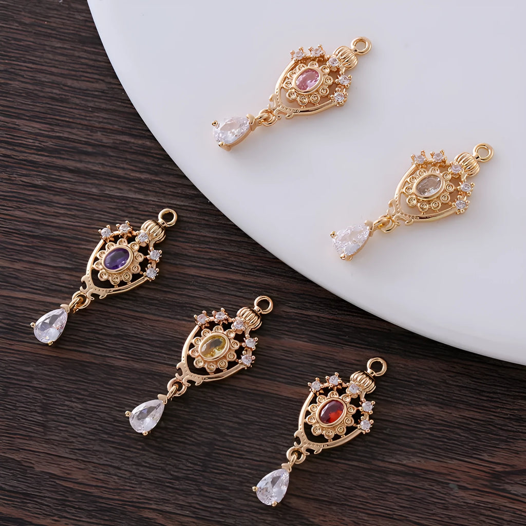 Water drop-shaped pendant with hollow crown design and micro inlaid zircon.