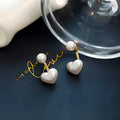 Heart-shaped pearl stud earrings with alloy setting and artificial gemstones in Korean style