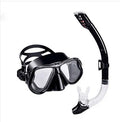 Set of black diving goggles with a PC frame, transparent glass lens, silicone mouthpiece, and adjustable strap