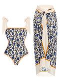 Women's printed two-piece chiffon swimsuit with matching hip skirt in a floral design.