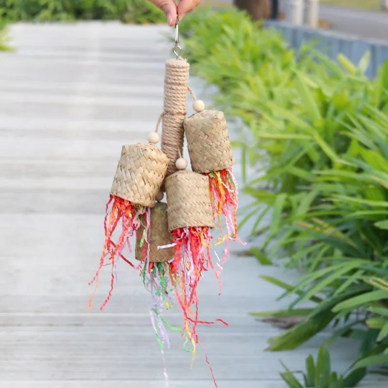 Colourful wooden parrot shredding toy with sisal fibre, measuring 15cm by 35cm.