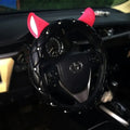 Black Rose Red steering wheel cover with rhinestones from Super Cute Ear series on a car steering wheel