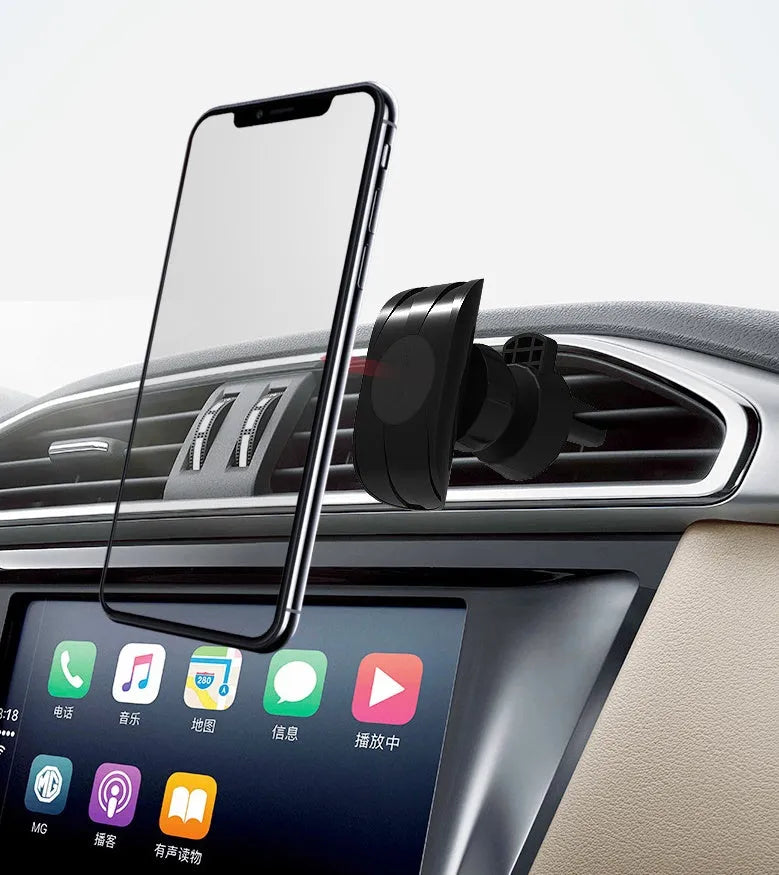 Black car phone holder clipped to a car air vent