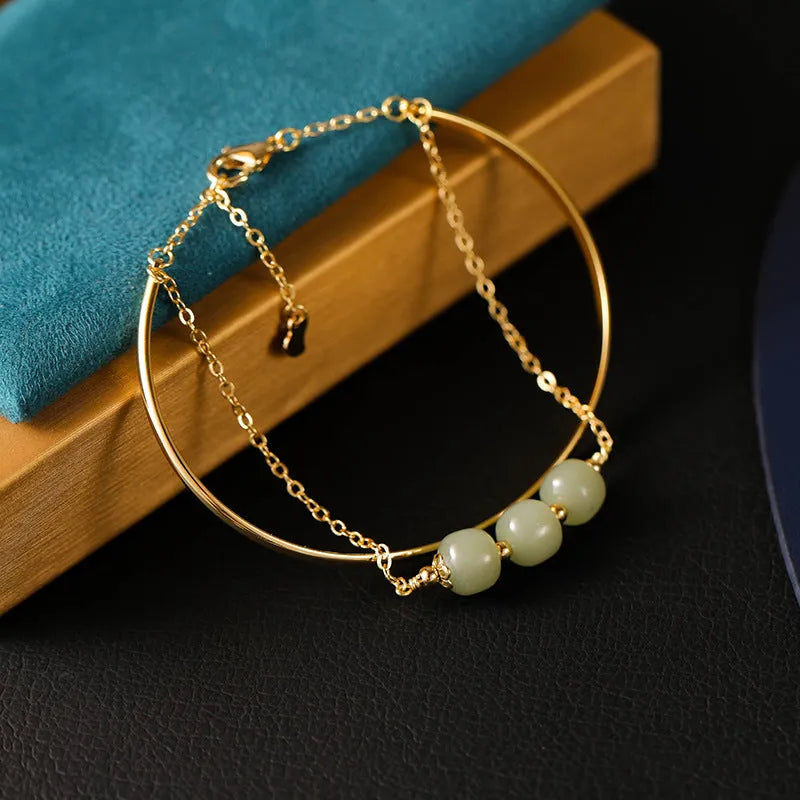 Hetian jade lucky beads bracelet with gold inlay, shown in single, double, and three bead versions.