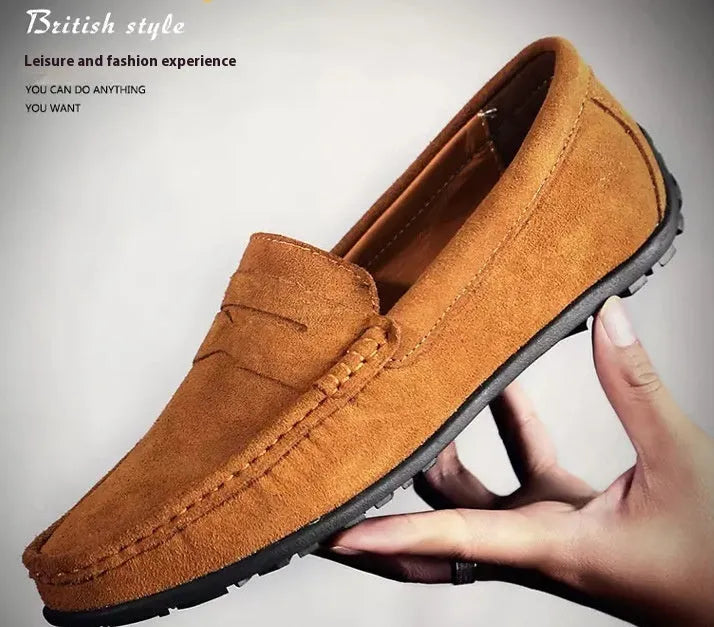 Men's suede casual slip-on shoes in black with round toe and flat rubber sole.