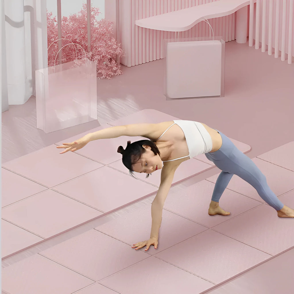 Blue folding portable TPE gymnastics mat unfolded on a floor, showing its 183cm length and non-slip texture.