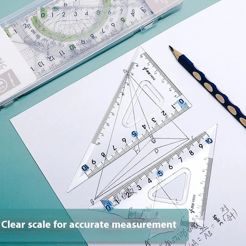 Transparent acrylic geometry ruler set with protractor, square, triangle, and ruler on a drawing
