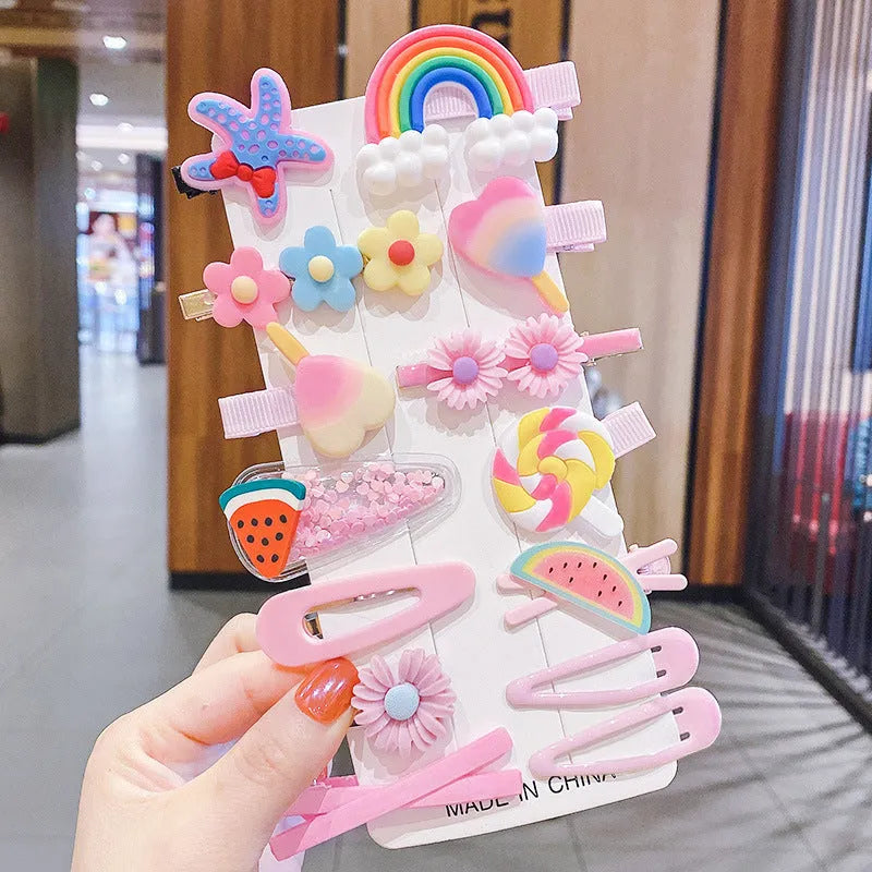 14-piece toddler hair accessories set: colourful rainbow, fruit, and butterfly barrettes in soft silicone clay.