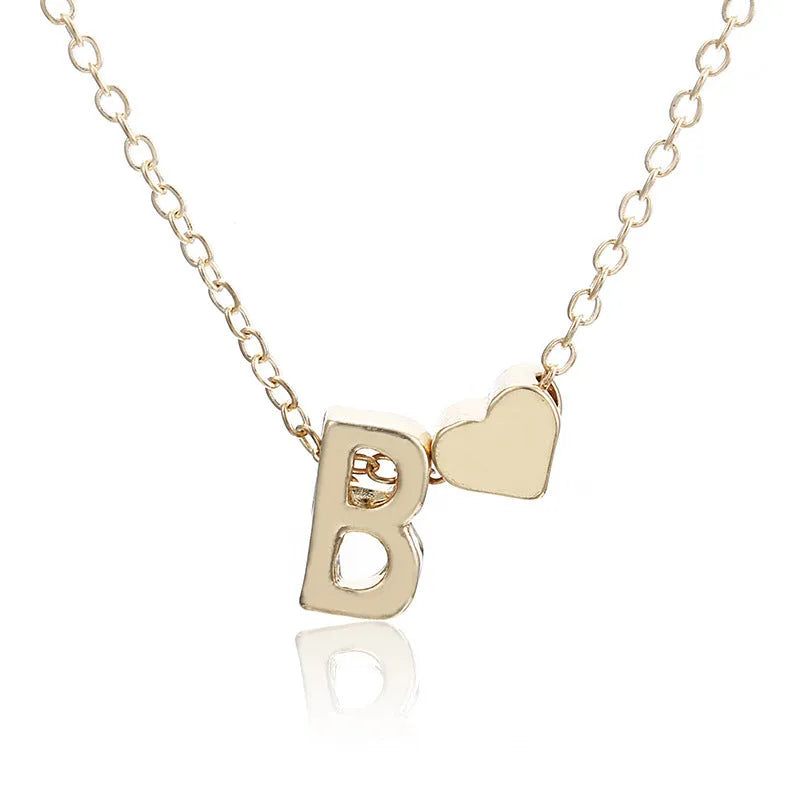 Peach heart shaped letter pendant necklace in gold and silver alloy jewellery