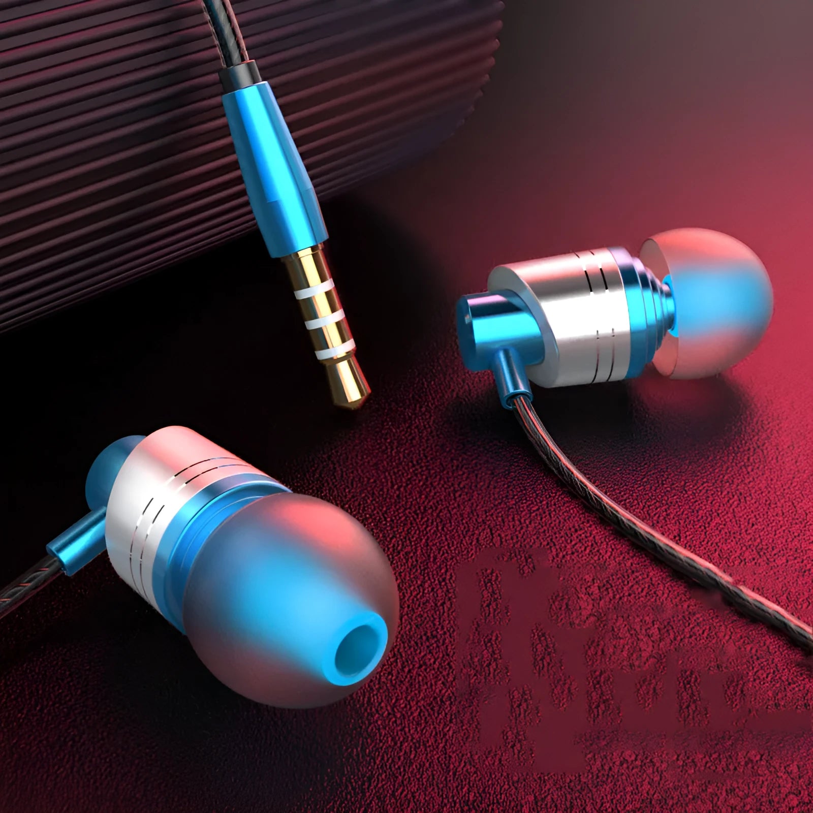 Wired in-ear earphones with microphone, 3.5mm plug, and red/blue/black colour options on a 1.2m TPE cable.