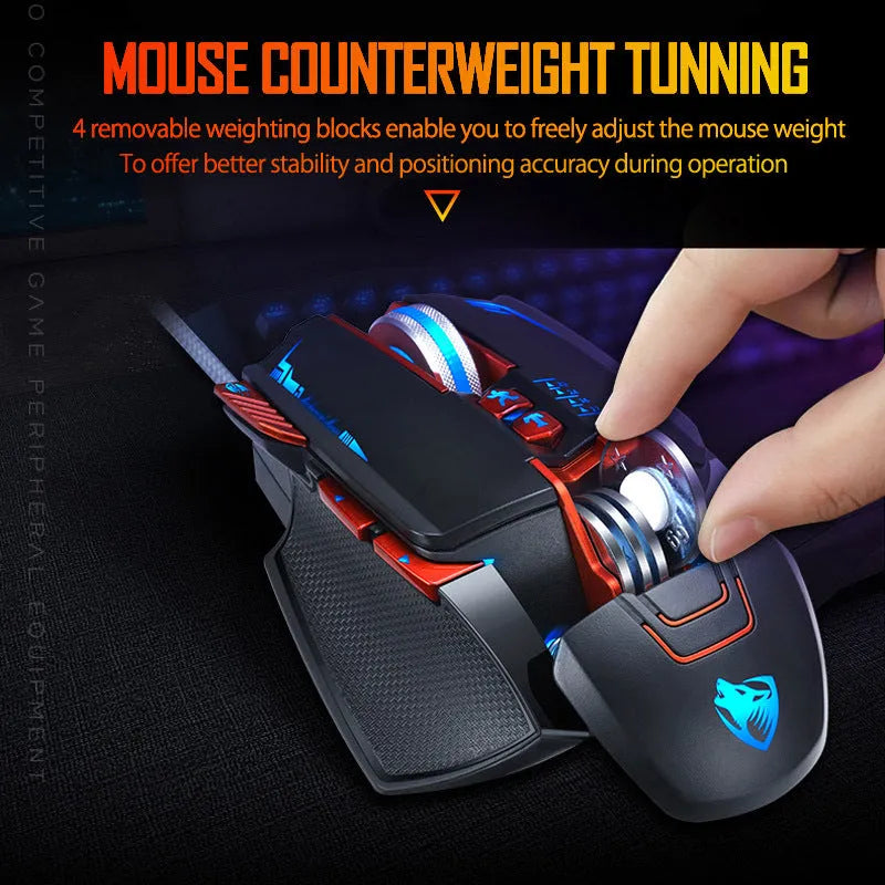 Thunder Wolf V9 wired gaming mouse in black or grey on a mousepad, showing its six buttons and ergonomic shape.