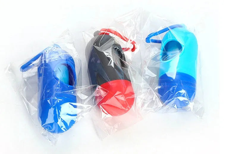 Six different coloured dog waste bags showing black, blue, green, pink, red and purple options