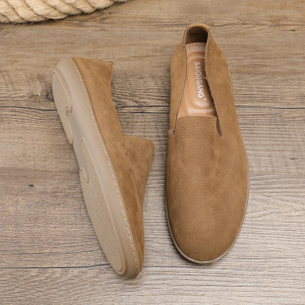 Handmade grey and khaki men's low-top casual sneakers with a cowhide upper and rubber wedge sole.