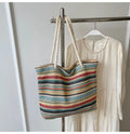 Blue straw woven nylon shoulder bag with single strap and polyester lining