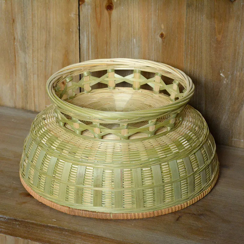 Handwoven natural bamboo storage basket showing three size variations