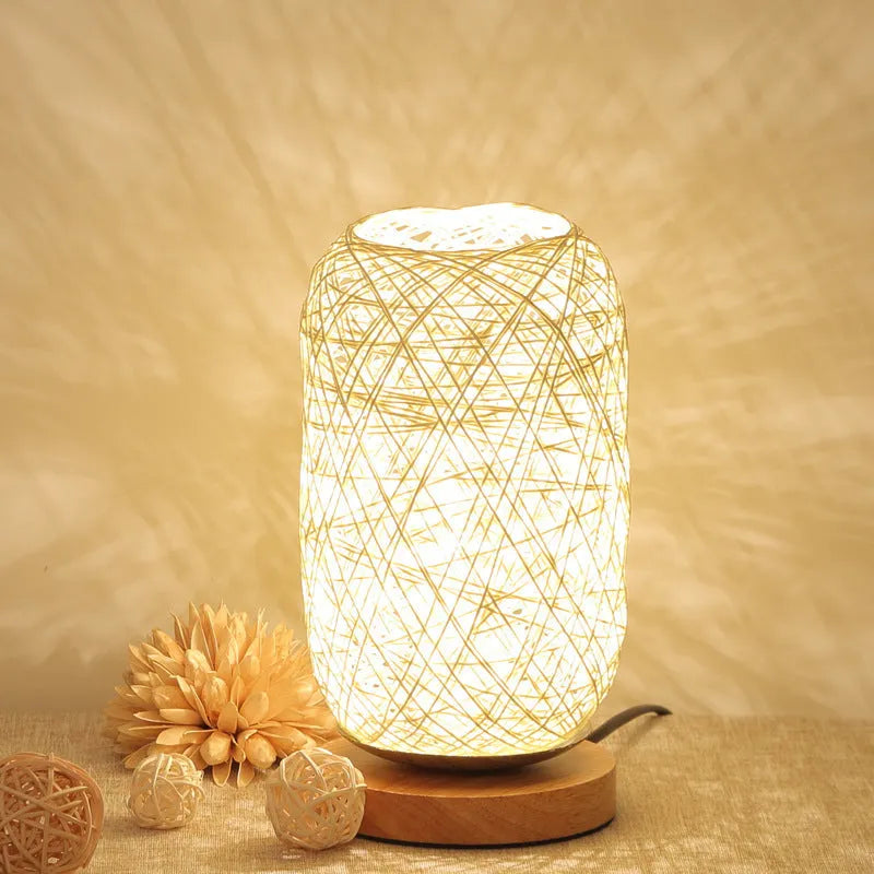 Sepak Takraw ball design desk lamp made from brown hemp rope with LED light and wooden base