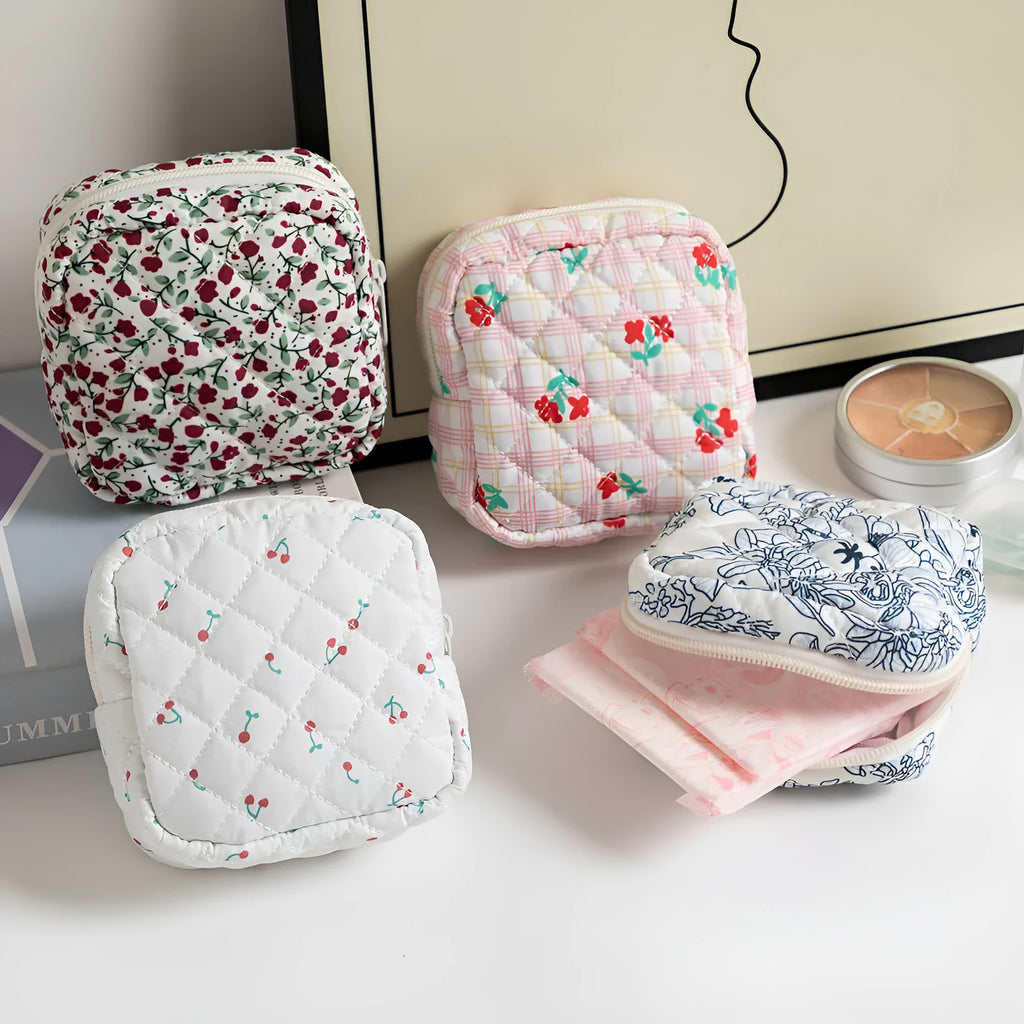 Floral print polyester key storage bag with sewing thread decoration in pink small flower colour.