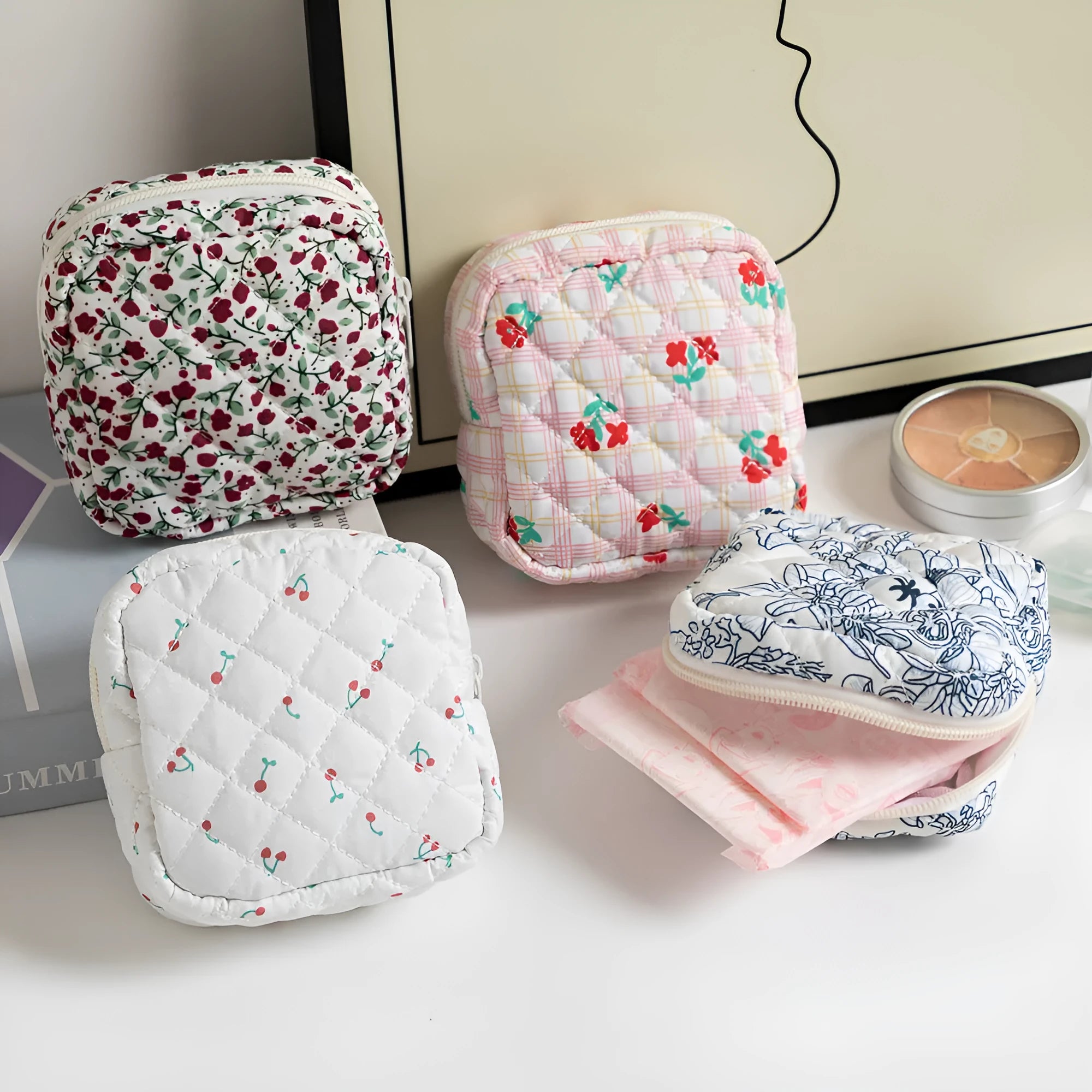 Floral print polyester key storage bag with sewing thread decoration in pink small flower colour.